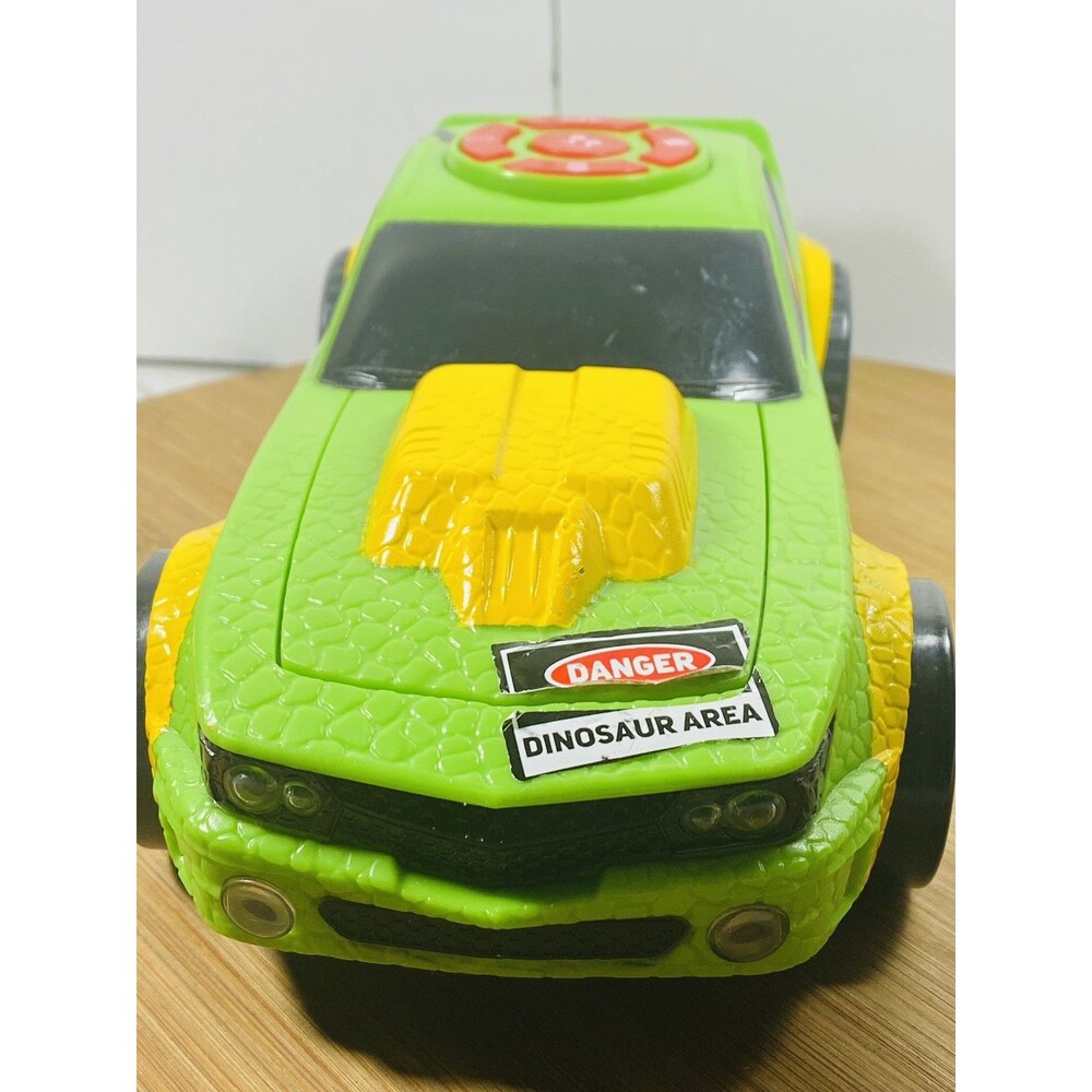 2019 KID GALAXY Dino Car w/Lights/Sounds And Pop Up Action!Battery Operated 10.5